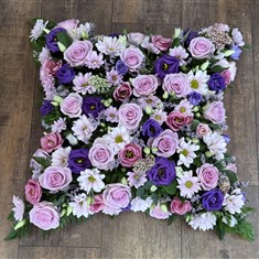 Loose pink and purple cushion